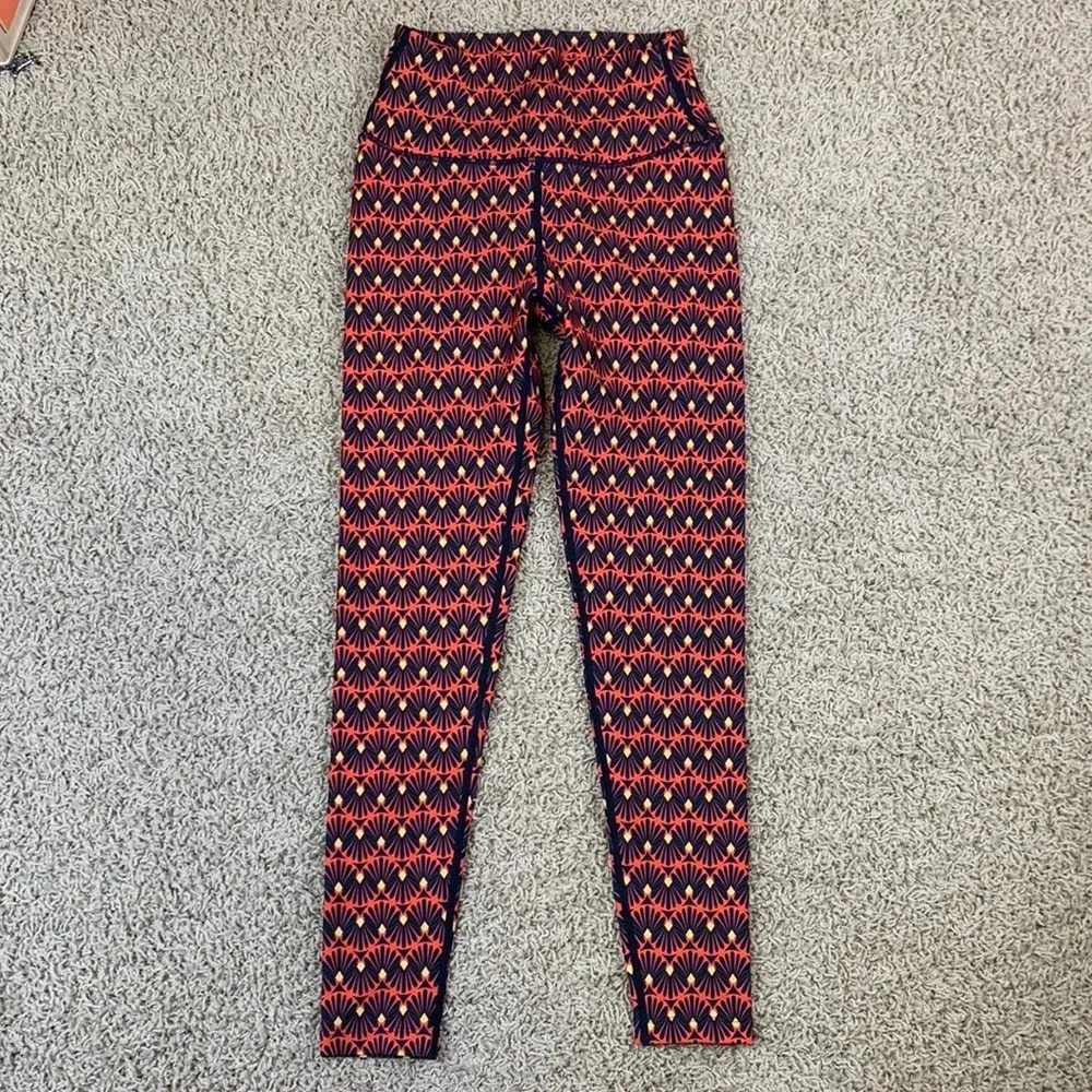 NWOT Splits59 navy and orange abstract leggings sz sm